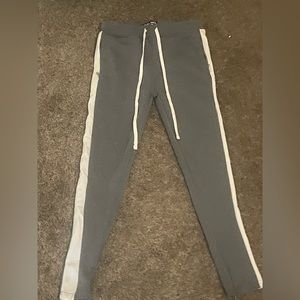 grey track pants
